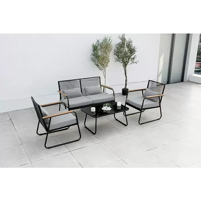 Acamp Loungemöbel-Set Paxos - 4 -tlg., Stahl/Polywood/Polyrattan/Polyester/Glas, Schwarz/Teak-färbig/Grau - Stimmungsaufnahme