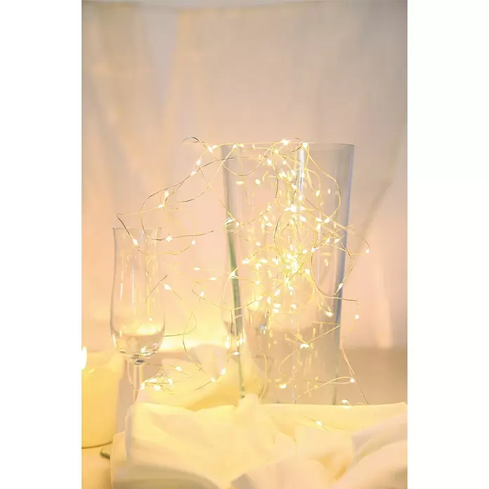 Globo Guirnalda luminosa LED Venuto - Para interior, 100 luces, Longitud del cable: 9,9 m, Cobre, Plateado metálico, Transparente - Foto ambiente