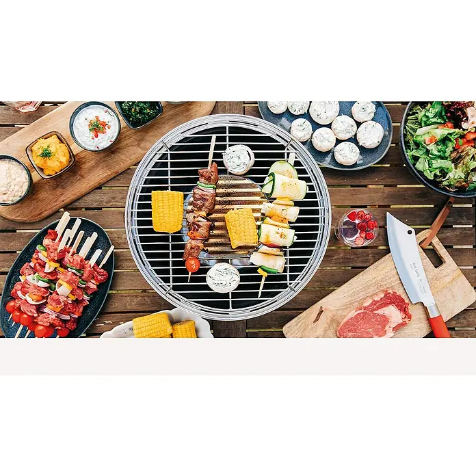 LotusGrill Barbacoa de carbón con poco humo - Negro, Superficie parrilla: Ø 34 cm - Foto ambiente