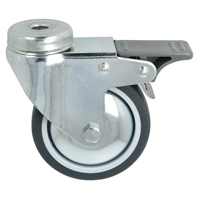 Stabilit Rueda giratoria para equipos - Diámetro ruedas: 75 mm, Capacidad de carga: 50 kg, Casquillo liso, Con agujero pasante y freno - Vista angular