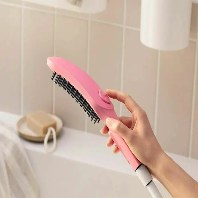 Grifo de ducha - Plástico, Rosa - Producto en uso