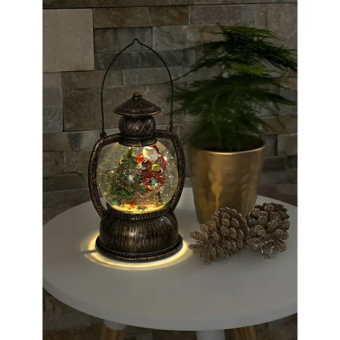 Konstsmide Led-sneeuwlantaarn Bolvormige lantaarn met kerstman - Binnen, 1 lamp, l x b x h: 12,7 x 10,8 x 20 cm, Werkt op batterijen - Zijaanzicht links