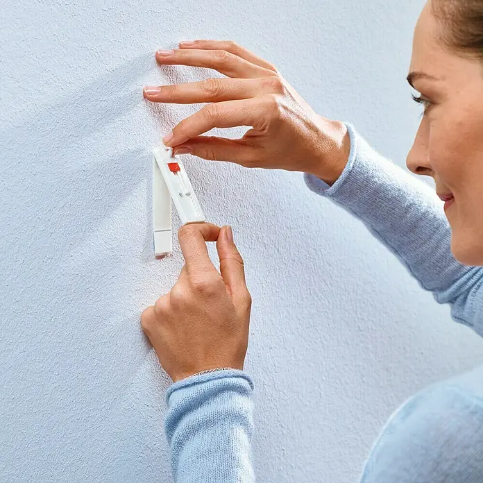 Tesa Clavo adhesivo ajustable - Apto para: Paredes pintadas, Carga soportada: 1 kg, 2 uds., Blanco