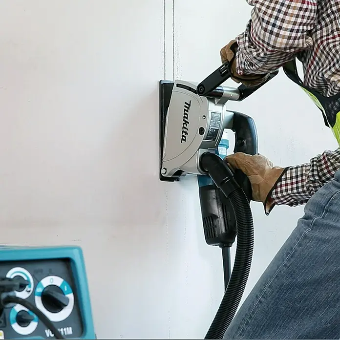 Makita Mauernutfräse SG1251J - Leistungsaufnahme: 1.400 W, Durchmesser Scheibe: 125 mm, Fräsbreite: 6 mm - 30 mm - Anwendungsbeispiel