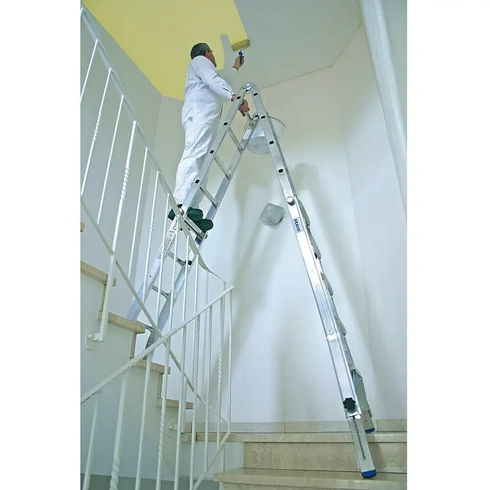 Krause Stabilo Sprossen-Gelenk-Teleskopleiter mit 4 Holmverlängerungen - Arbeitshöhe: 6,05 m, 4 x 5 Sprossen, Treppenfunktion, Aluminium - Anwendungsbeispiel