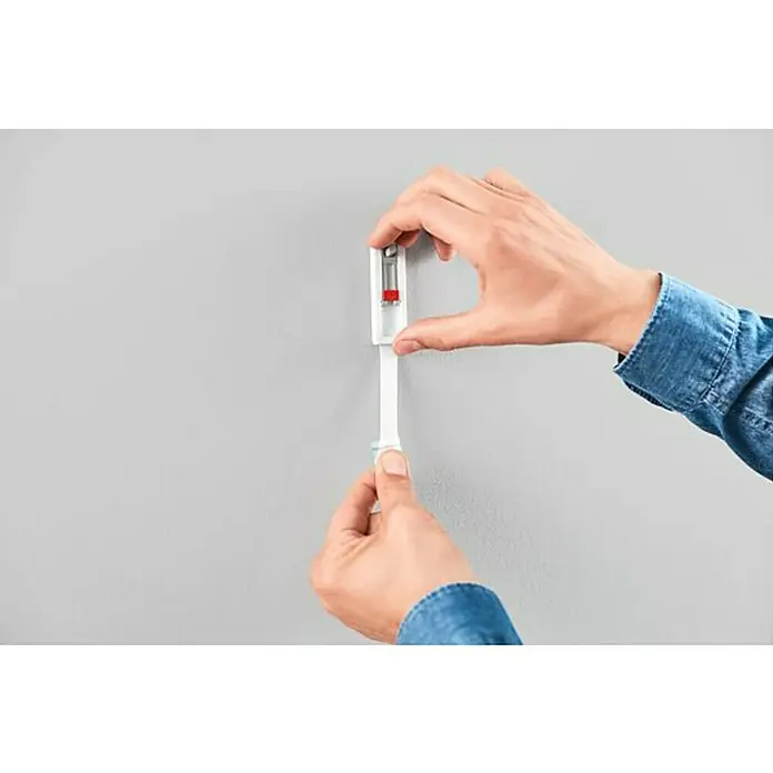 Tesa Clavo adhesivo ajustable - Apto para: Papel pintado, Carga soportada: 0,5 kg, Blanco, 2 uds. - Producto en uso