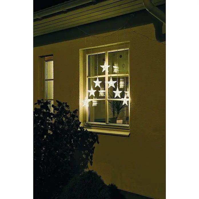 Konstsmide Led-lichtgordijn - Buiten, 35 lampen, l x h: 5,76 x 1,16 m, Warm wit - Sfeeropname