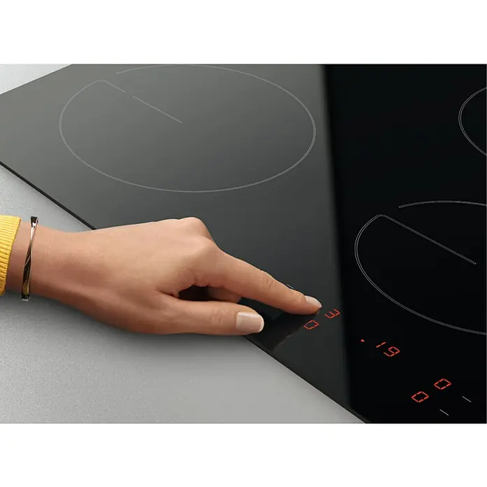 Zanussi Placa de cocción vitrocerámica ZHRX639K - Zonas de cocción: 3 ud., Eléctrico, Indicador de calor residual, Vitrocerámica - Primer plano