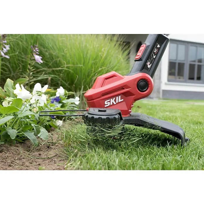 Skil Akumulatorski trimer 0240CA - 18 V, Bez akumulatora, Širina reza: 30 cm - Proizvod u upotrebi