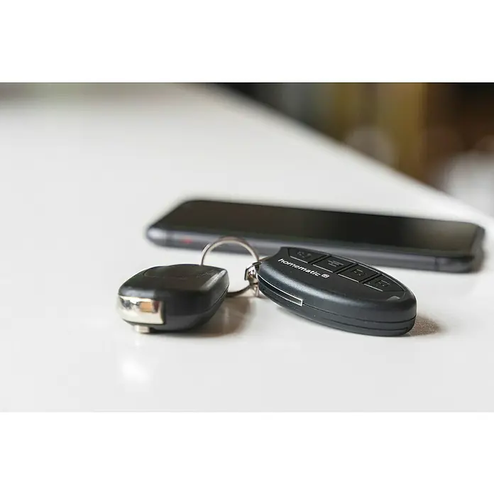 Homematic IP Funkfernbedienung HmIP-KRCK - Passend für: Homematic IP Türschlossantrieb, Schwarz, 75 x 38 x 14 mm - Stimmungsaufnahme