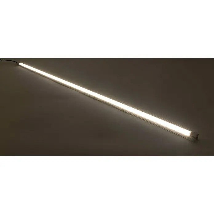 Ritter Leuchten Podelementna LED svjetiljka - 15 W, Duljina: 100 cm, Topla bijela - Duga LED cijevna svjetiljka koja emitira jak sjaj. Leži dijagonalno na ravnoj površini, osvjetljavajući površinu.