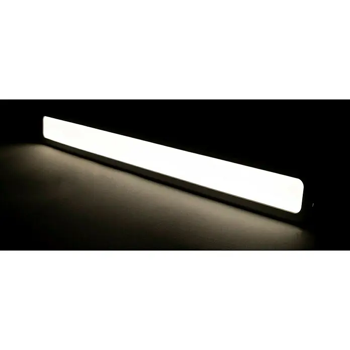 Ritter Leuchten Podelementna LED svjetiljka - 4,5 W, Duljina: 60 cm, Topla bijela - Detaljan prikaz moderne, izdužene LED svjetiljke koja emitira jarko bijelo svjetlo na tamnoj površini.