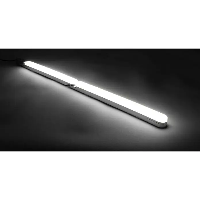 Ritter Leuchten Podelementna LED svjetiljka početni set - 6,8 W, Duljina: 32,4 cm, Topla bijela - Snimak moderne bijele LED cijevi koja emitira jako svjetlo, ležeći na tamnoj površini. Savršeno za minimalističke dizajnerske koncepte.