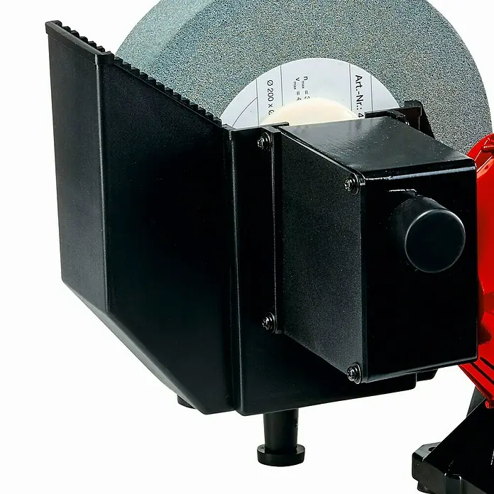 Einhell Esmeriladora en seco y en húmedo TC-WD 200/150 - 170 W, Diámetro muela abrasiva: 150 mm, 2.980 r.p.m. - Primer plano de una amoladora de banco con una muela y un protector de seguridad negro.