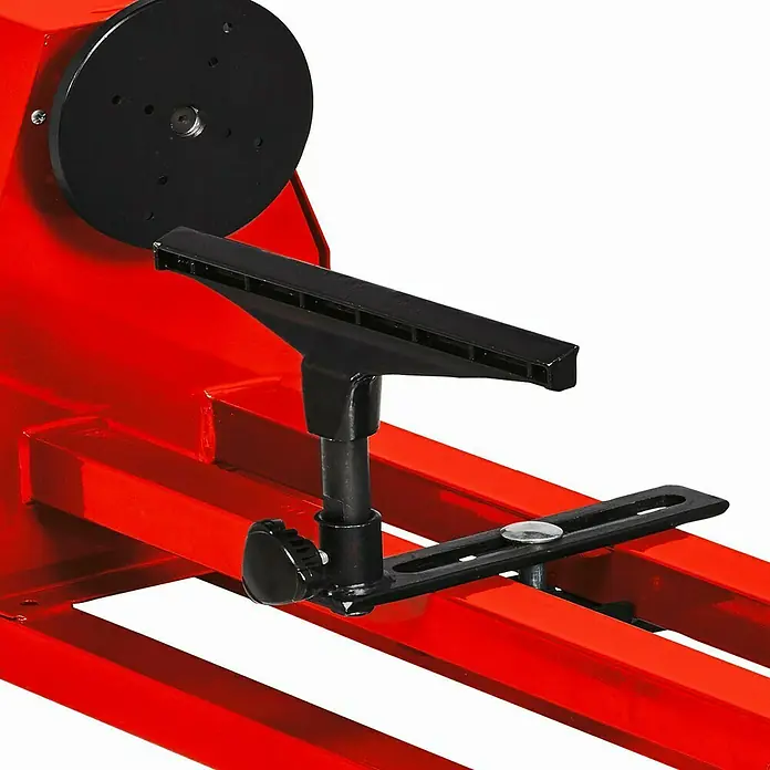 Einhell Torno para madera TC-WW 1000/1 - 400 W, Número de revoluciones del husillo: 890 - 2.600 r.p.m. - Primer plano de un torno de madera rojo con un soporte para herramientas negro y un plato frontal negro.