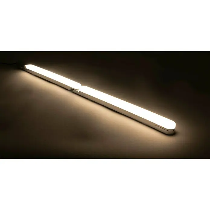 Ritter Leuchten Podelementna LED svjetiljka početni set - 6,8 W, Duljina: 32,4 cm, Topla bijela - Krupni plan dvodijelne, bijele LED svjetiljke koja leži na površini i emitira jarko, toplo svjetlo.