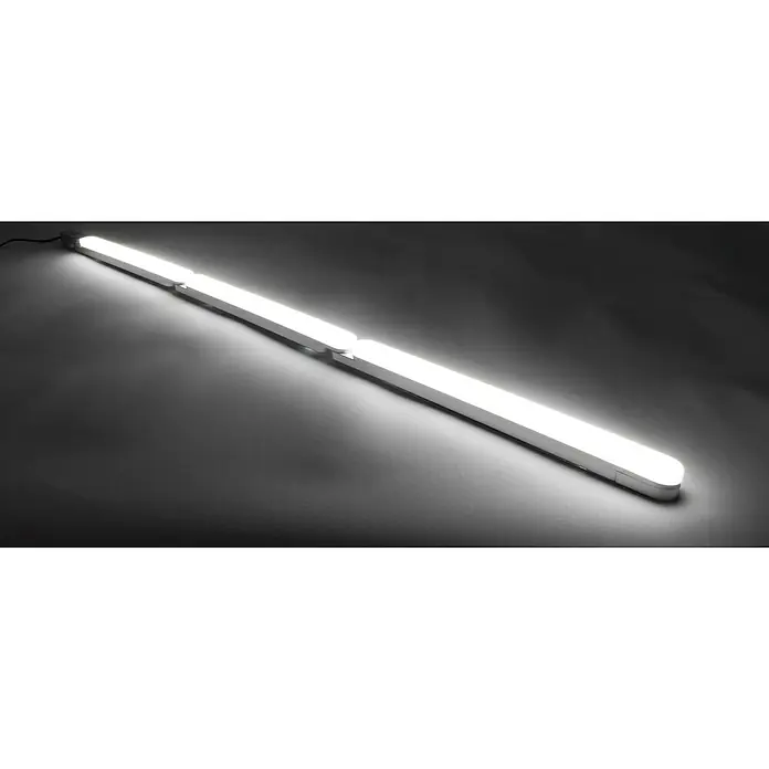 Ritter Leuchten Podelementna LED svjetiljka - 3,4 W, Duljina: 32,4 cm, Topla bijela - Ova slika prikazuje tri LED svjetla povezana zajedno koja leže na sivoj površini i emitiraju svijetli, fokusirani sjaj.