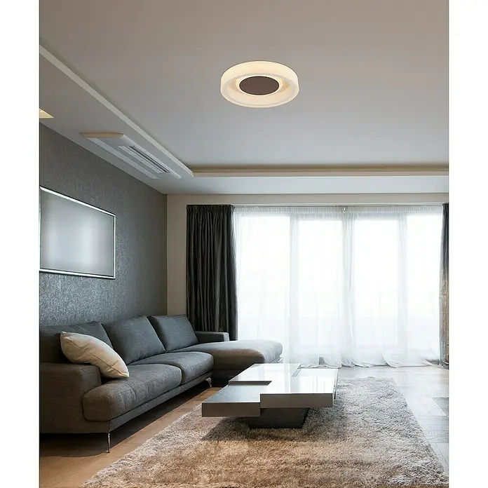 Globo LED-Deckenleuchte rund Goffi - 30 W, Ø x H: 35 x 9 cm - Modernes Wohnzimmer mit einer stilvollen, runden Deckenleuchte, die für angenehmes Licht sorgt. Graue Couch und ein Couchtisch auf einem Teppich.