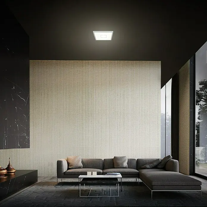 Tween Light LED-Deckenleuchte Montella - 12 W, L x B x H: 19 x 19 x 2,8 cm, Weiß/Silber - Wohnzimmer mit moderner Deckenleuchte. Graues Sofa, Couchtisch und schwarzer Teppich ergänzen das stilvolle Interieur unter der quadratischen Leuchte.