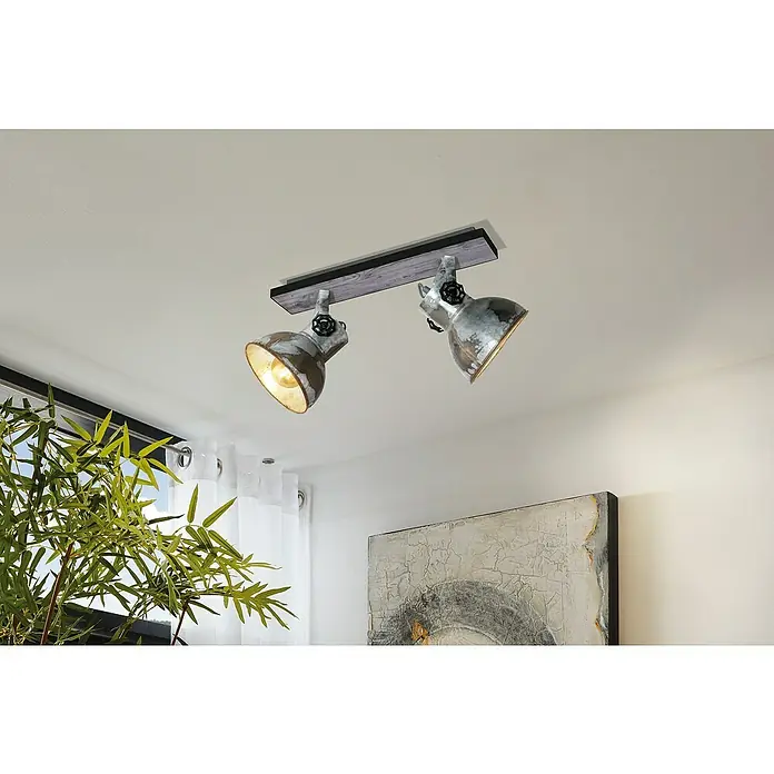 Eglo Barnstaple Deckenstrahler - 80 W, E27 - Deckenleuchte mit zwei verstellbaren Strahlern im Industrie-Stil. Die Lampen sind aus Metall gefertigt und auf einer Holzbasis montiert.
