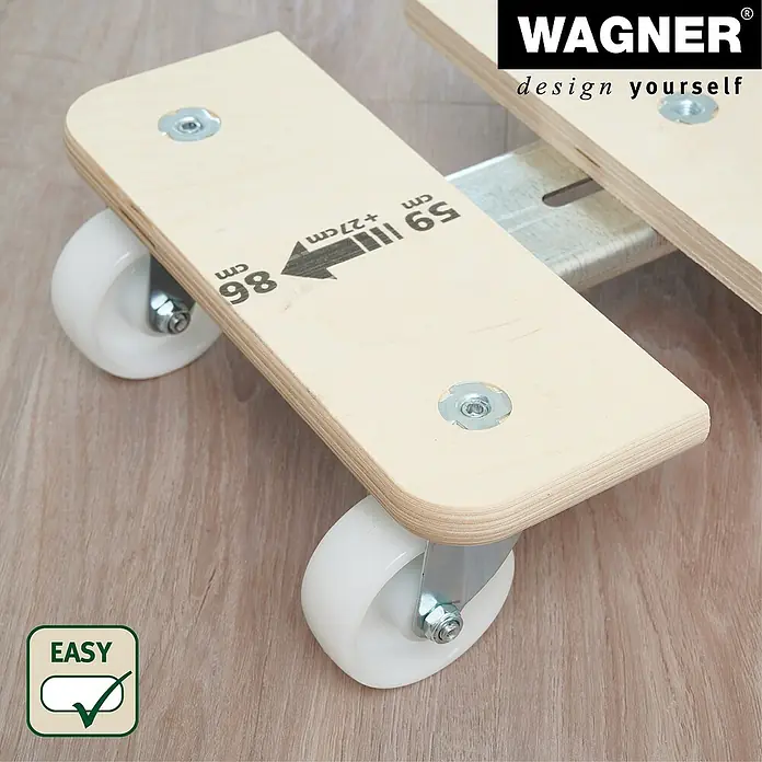Wagner System Transportroller MM 1331 - Breite: 290 mm, Traglast: 200 kg, Längenverstellbarkeit: 590 mm - 860 mm - Nahaufnahme einer Wagenheber-Plattform mit weißen Rollen. Auf der Oberseite sind Messwerte und das Logo des Herstellers WAGNER abgebildet.