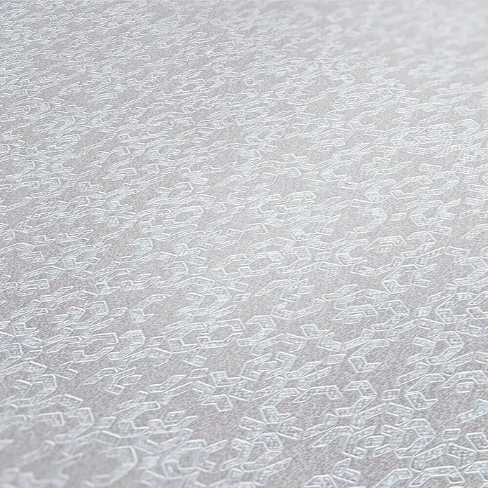AS Creation Metropolitan Stories II Vliestapete Metallornament - Creme, Ornament, 10,05 x 0,53 m - Nahaufnahme einer weißen Oberfläche mit einem filigranen, sich wiederholenden Muster, ideal als Textur oder Hintergrund.