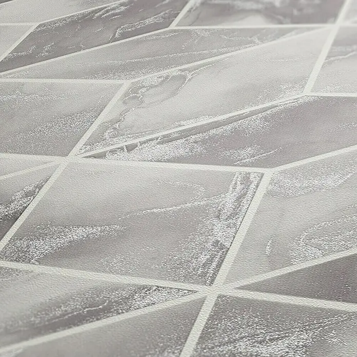AS Creation Metropolitan Stories II Vliestapete Marmor - Grau/Silber, Steinoptik, 10,05 x 0,53 m - Nahaufnahme einer grauen geometrischen Tapete mit Marmormuster.