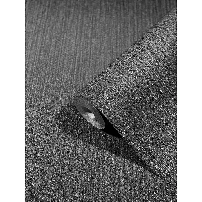 SCHÖNER WOHNEN-Kollektion New Spirit Vliestapete Struktur - Anthrazit, Uni, 10,05 x 0,53 m - Nahaufnahme einer Rolle grauer, strukturierter Tapete, die ein subtiles, aber elegantes Design für moderne Innenräume bietet.