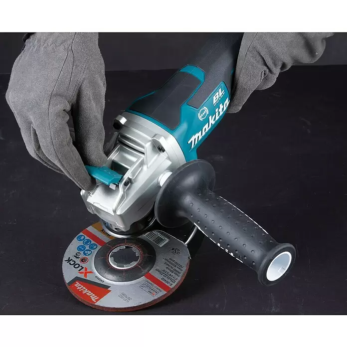 Makita Akku-Winkelschleifer DGA519Z - 18 V, Ohne Akku, Leerlaufdrehzahl: 3.000 U/min - 8.500 U/min - Detailaufnahme